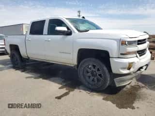 2017 Chevrolet Silverado 1500 LT z VIN 3GCUKREC4HG146590, wystawiony jako Copart lot #82129635 z przebiegiem 152 731 mil mil oraz Czysty tytuł • Clean title. Historia ofert i sprzedaży dostępna na DreamBid. Obrazek 4.