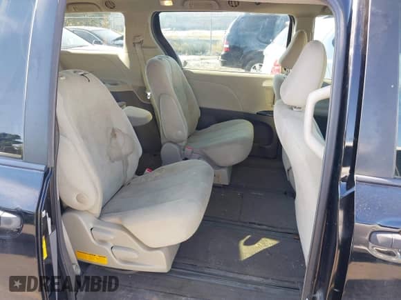 2013 Toyota Sienna L with VIN 5TDZK3DC7DS287069, listed as a IAAI auction lot 40249320 with 113,482 mi miles and . Bid and sale history available at DreamBid. Image 8.