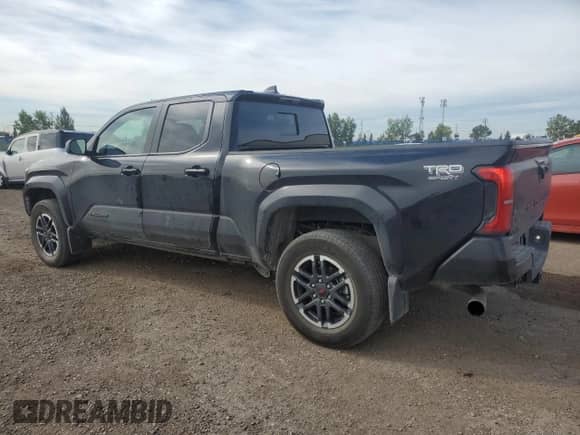 2024 Toyota Tacoma SR5 with VIN 3TYLB5JN2RT055045, listed as a Copart auction lot 69134065 with 25,584 mi miles and Salvage title. Bid and sale history available at DreamBid. Image 2.