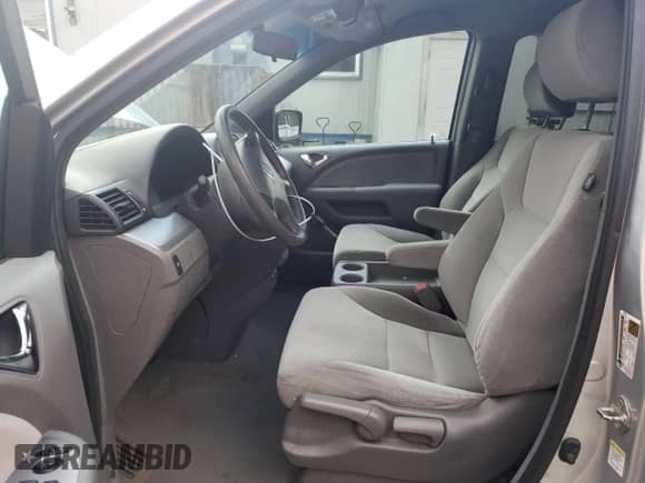 2010 Honda Odyssey LX with VIN 5FNRL3H26AB024960, listed as a Copart auction lot 70644855 with 194,218 mi miles and Salvage title. Bid and sale history available at DreamBid. Image 7.