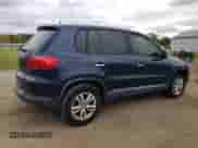 2014 Volkswagen Tiguan S with VIN WVGAV3AX7EW567292, listed as a Copart auction lot 82524095 with 139,283 mi miles and Clean title. Bid and sale history available at DreamBid. Image 3.