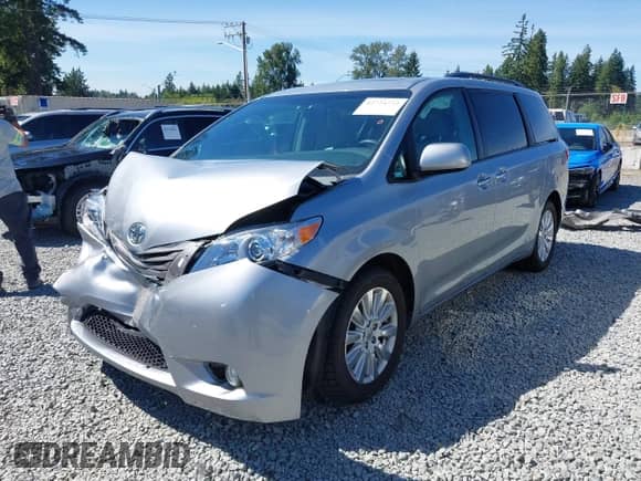 2015 Toyota Sienna Limited with VIN 5TDDK3DC5FS126524, listed as a IAAI auction lot 42724732 with 98,946 mi miles and . Bid and sale history available at DreamBid. Image 2.