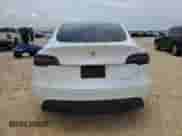 2023 Tesla Model Y Long Range with VIN 7SAYGDEE8PA067712, listed as a Copart auction lot 63824464 with 30,863 mi miles and Salvage title. Bid and sale history available at DreamBid. Image 6.