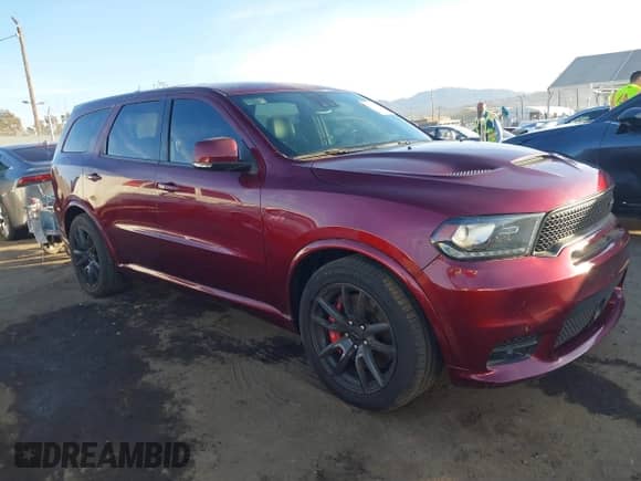 2019 Dodge Durango SRT with VIN 1C4SDJGJXKC556870, listed as a IAAI auction lot 41125324 with 16,857 mi miles and . Bid and sale history available at DreamBid. Image 1.