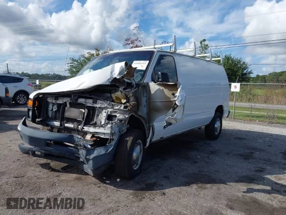 2013 Ford Econoline Cargo Commercial with VIN 1FTNE2EW0DDA41310, listed as a IAAI auction lot 43405112 with 185,163 mi miles and . Bid and sale history available at DreamBid. Image 2.