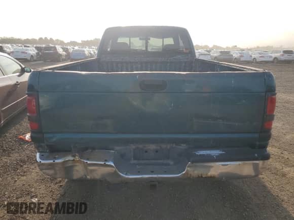 1999 Dodge 2500 with VIN 3B7KF23W5XG211333, listed as a Copart auction lot 71466855 with 209,282 mi miles and Salvage title. Bid and sale history available at DreamBid. Image 6.