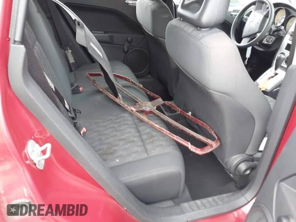 2008 Dodge Caliber SE with VIN 1B3HB28B18D561909, listed as a IAAI auction lot 42957456 with 167,709 mi miles and . Bid and sale history available at DreamBid. Image 8.