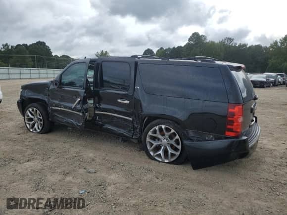 2014 Chevrolet Suburban LTZ с VIN 1GNSKKE7XER239070, выставлен на аукционе Copart как лот 85556165 с пробегом 186 343 миль миль и Чистый • Clean title. История ставок и продаж доступна на DreamBid. Изображение 2.