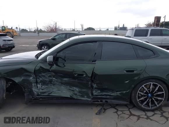 2023 BMW i4 eDrive40 with VIN WBY73AW05PFP88444, listed as a IAAI auction lot 42197054 with 59,253 mi miles and . Bid and sale history available at DreamBid. Image 14.