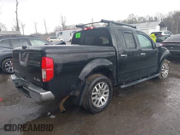 2011 Nissan Frontier Pro-4X z VIN 1N6AD0EV5BC440663, wystawiony jako IAAI lot #41923918 z przebiegiem 168 331 mil mil oraz . Historia ofert i sprzedaży dostępna na DreamBid. Obrazek 4.
