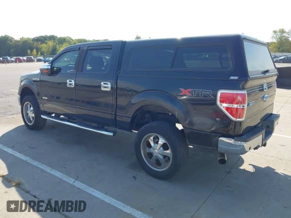 2013 Ford F-150 Lariat with VIN 1FTFW1ET3DKE67750, listed as a IAAI auction lot 43240995 with 159,269 mi miles and . Bid and sale history available at DreamBid. Image 3.