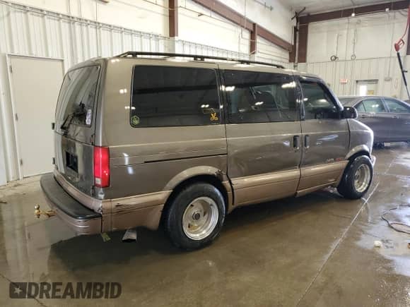 2000 Chevrolet Astro z VIN 1GNEL19W1YB207689, wystawiony jako Copart lot #54711595 z przebiegiem 253 766 mil mil oraz Nie do naprawy • Non repairable. Historia ofert i sprzedaży dostępna na DreamBid. Obrazek 3.