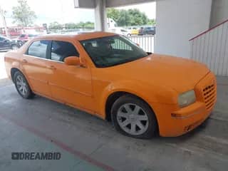 2005 Chrysler 300 Touring with VIN 2C3AA53G25H585355, listed as a IAAI auction lot 42878267 with 219,370 mi miles and . Bid and sale history available at DreamBid. Image 1.