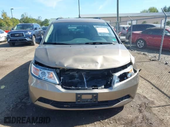 2013 Honda Odyssey LX with VIN 5FNRL5H27DB017516, listed as a IAAI auction lot 43245571 with 141,666 mi miles and . Bid and sale history available at DreamBid. Image 13.