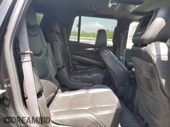 2016 Cadillac Escalade Platinum z VIN 1GYS4DKJ9GR123242, wystawiony jako Copart lot #59787415 z przebiegiem 135 786 mil mil oraz Szkoda całkowita • Salvage title. Historia ofert i sprzedaży dostępna na DreamBid. Obrazek 11.