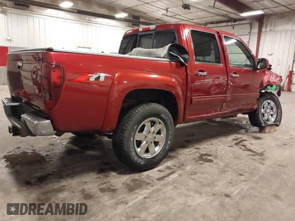 2011 Chevrolet Colorado 2LT with VIN 1GCHSDFE6B8112586, listed as a IAAI auction lot 43285236 with 116,890 mi miles and . Bid and sale history available at DreamBid. Image 4.