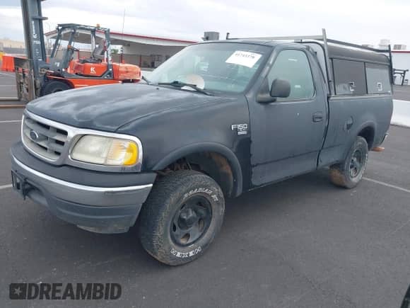 2000 Ford F-150 XL with VIN 2FTRF18W1YCA42685, listed as a IAAI auction lot 41743378 with 211,072 mi miles and . Bid and sale history available at DreamBid. Image 2.