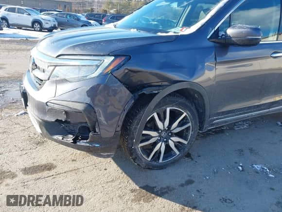 2021 Honda Pilot Touring 7-Passenger with VIN 5FNYF6H61MB089338, listed as a IAAI auction lot 41417656 with 54,421 mi miles and . Bid and sale history available at DreamBid. Image 6.