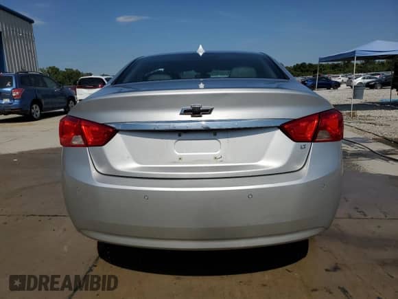 2014 Chevrolet Impala LT with VIN 2G1125S34E9107951, listed as a Copart auction lot 71819865 with 150,963 mi miles and Salvage title. Bid and sale history available at DreamBid. Image 6.