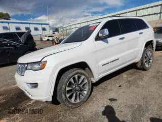 2018 Jeep Grand Cherokee High Altitude with VIN 1C4RJFCM9JC401438, listed as a Copart auction lot 81042115 with 73,127 mi miles and Salvage title. Bid and sale history available at DreamBid. Image 1.