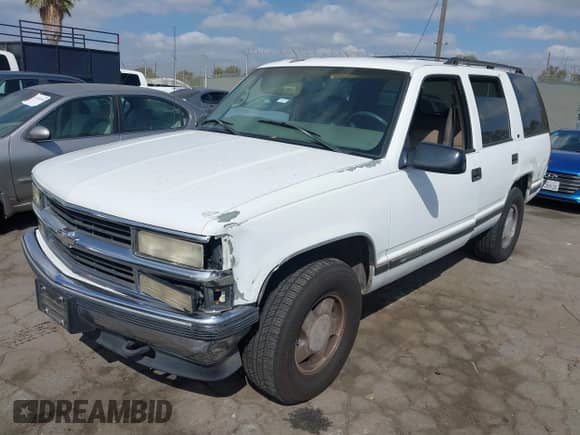 1997 Chevrolet Tahoe with VIN 1GNEK13RXVJ428831, listed as a IAAI auction lot 43348161 with 162,463 mi miles and . Bid and sale history available at DreamBid. Image 2.