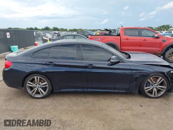2015 BMW 4 Series 435i with VIN WBA4B1C5XFD418024, listed as a IAAI auction lot 43284093 with 117,629 mi miles and . Bid and sale history available at DreamBid. Image 12.