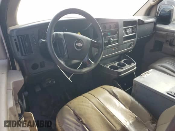 2008 Chevrolet Express Cargo с VIN 1GCFG15X781227581, выставлен на аукционе Copart как лот 82034175 с пробегом 214 404 миль миль и Списание • Salvage title. История ставок и продаж доступна на DreamBid. Изображение 8.
