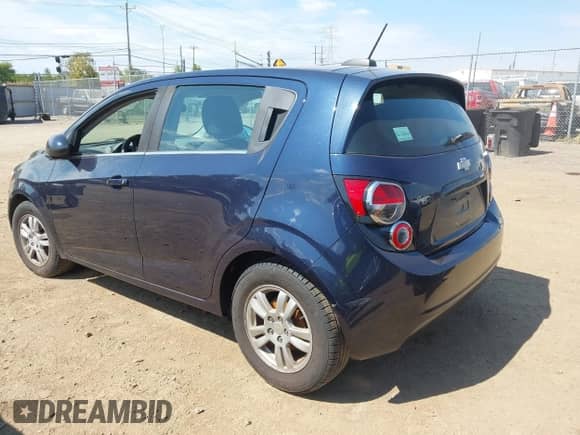 2015 Chevrolet Sonic LT with VIN 1G1JC6SH3F4208658, listed as a IAAI auction lot 43198771 with 143,007 mi miles and . Bid and sale history available at DreamBid. Image 3.