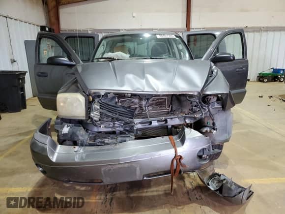 2007 Dodge Dakota SLT z VIN 1D7HE48P67S198715, wystawiony jako Copart lot #46497595 z przebiegiem 171 572 mil mil oraz Szkoda całkowita • Salvage title. Historia ofert i sprzedaży dostępna na DreamBid. Obrazek 11.