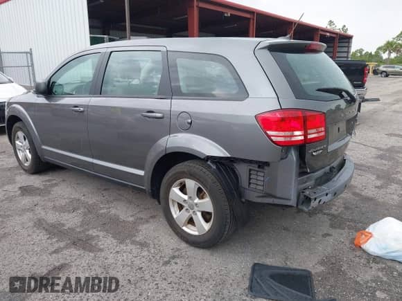 2013 Dodge Journey SE with VIN 3C4PDCAB6DT529949, listed as a IAAI auction lot 42609006 with 38,202 mi miles and . Bid and sale history available at DreamBid. Image 3.