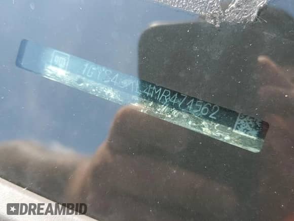 2021 Cadillac Escalade Premium Luxury with VIN 1GYS4BKL4MR474562, listed as a Copart auction lot 62931635 with 59,641 mi miles and Salvage title. Bid and sale history available at DreamBid. Image 13.