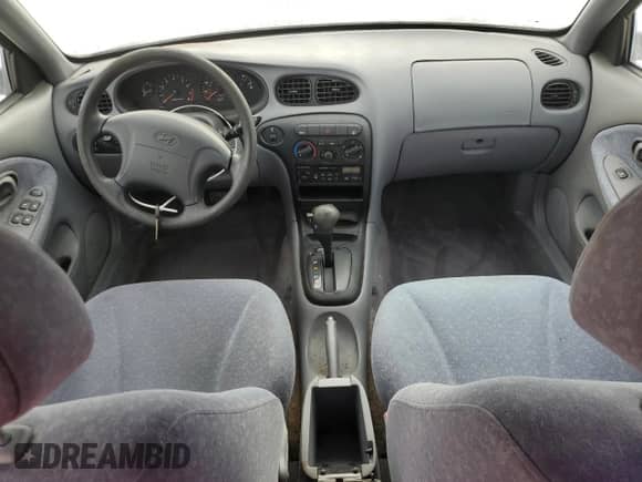 2000 Hyundai Elantra GLS z VIN KMHJF35F9YU032902, wystawiony jako Copart lot #45145955 z przebiegiem 79 229 mil mil oraz Czysty tytuł • Clean title. Historia ofert i sprzedaży dostępna na DreamBid. Obrazek 8.