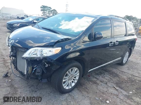 2015 Toyota Sienna XLE with VIN 5TDYK3DC2FS656032, listed as a IAAI auction lot 42662413 with 50,329 mi miles and . Bid and sale history available at DreamBid. Image 2.