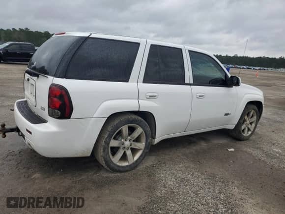 2007 Chevrolet TrailBlazer SS с VIN 1GNES13H572301473, выставлен на аукционе Copart как лот 80818955 с пробегом 216 903 миль миль и Списание • Salvage title. История ставок и продаж доступна на DreamBid. Изображение 3.