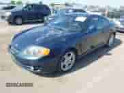 2003 Hyundai Tiburon GT с VIN KMHHN65F83U034197, выставлен на аукционе IAAI как лот 42383077 с пробегом 138 877 миль миль и . История ставок и продаж доступна на DreamBid. Изображение 2.