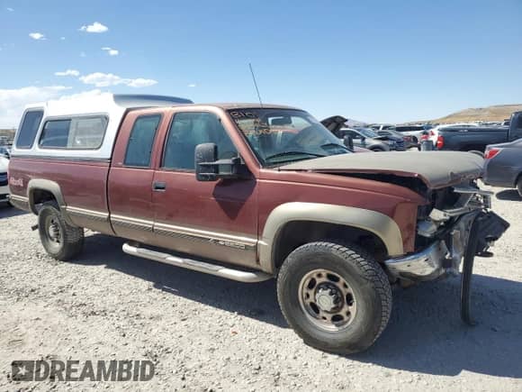 1998 Chevrolet Silverado 2500 с VIN 1GCGK29RXWE127131, выставлен на аукционе Copart как лот 66736205 с пробегом 189 791 миль миль и Списание • Salvage title. История ставок и продаж доступна на DreamBid. Изображение 4.