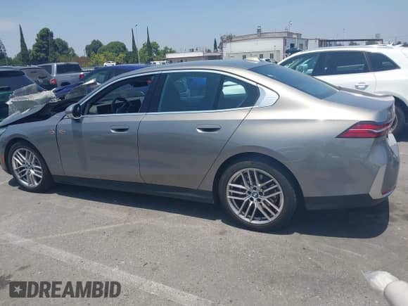 2024 BMW 5 Series 530i xDrive with VIN WBA53FJ06RCS35848, listed as a IAAI auction lot 42500565 with 23,188 mi miles and . Bid and sale history available at DreamBid. Image 14.