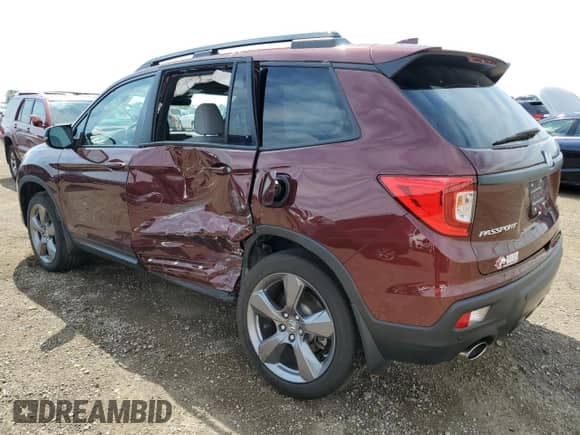 2019 Honda Passport Touring with VIN 5FNYF8H97KB027994, listed as a Copart auction lot 64122725 with 43,152 mi miles and Salvage title. Bid and sale history available at DreamBid. Image 2.