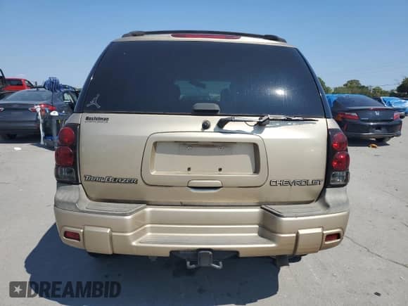2004 Chevrolet TrailBlazer LS z VIN 1GNDS13S242181215, wystawiony jako Copart lot #80672955 z przebiegiem 244 539 mil mil oraz Czysty tytuł • Clean title. Historia ofert i sprzedaży dostępna na DreamBid. Obrazek 6.