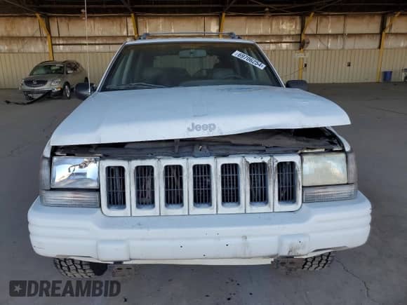 1996 Jeep Grand Cherokee with VIN 1J4EZ78Y9TC104398, listed as a Copart auction lot 69706254 with Not provided miles and Salvage title. Bid and sale history available at DreamBid. Image 5.