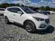 2018 Hyundai Santa Fe 2.4L с VIN 5NMZU3LB0JH100028, выставлен на аукционе Copart как лот 81184505 с пробегом 92 971 миль миль и Списание • Salvage title. История ставок и продаж доступна на DreamBid. Изображение 4.