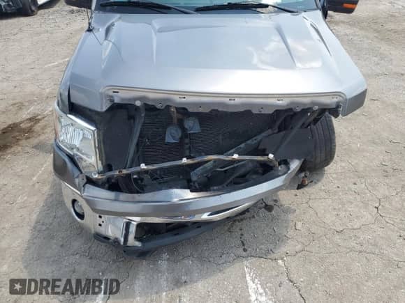 2012 Ford F-150 XL z VIN 1FTFW1EF0CFA82227, wystawiony jako Copart lot #67465015 z przebiegiem Nie podano mil oraz Szkoda całkowita • Salvage title. Historia ofert i sprzedaży dostępna na DreamBid. Obrazek 11.