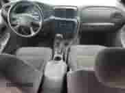 2003 Chevrolet TrailBlazer EXT LT z VIN 1GNET16S236241689, wystawiony jako Copart lot #55781825 z przebiegiem 210 651 mil mil oraz Szkoda całkowita • Salvage title. Historia ofert i sprzedaży dostępna na DreamBid. Obrazek 8.