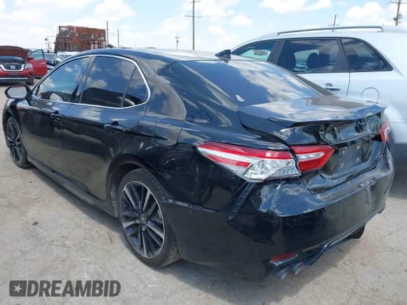 2020 Toyota Camry XSE z VIN 4T1K61AK0LU995546, wystawiony jako IAAI lot #43092509 z przebiegiem 93 700 mil mil oraz . Historia ofert i sprzedaży dostępna na DreamBid. Obrazek 3.