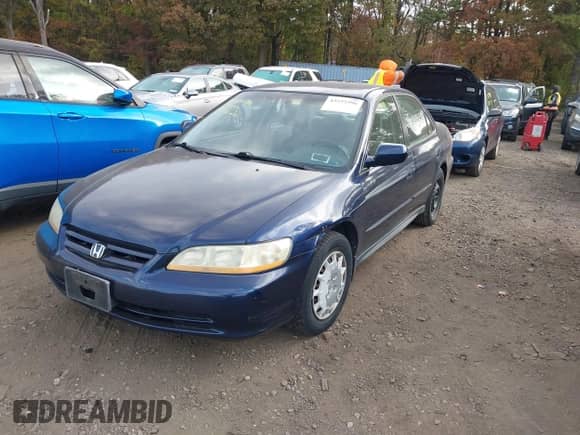 2002 Honda Accord LX with VIN 1HGCG66552A113262, listed as a IAAI auction lot 43532396 with 130,871 mi miles and . Bid and sale history available at DreamBid. Image 2.