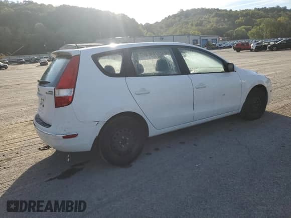 2012 Hyundai Elantra GLS z VIN KMHDB8AE5CU130952, wystawiony jako Copart lot #82003535 z przebiegiem 124 923 mil mil oraz Szkoda całkowita • Salvage title. Historia ofert i sprzedaży dostępna na DreamBid. Obrazek 3.