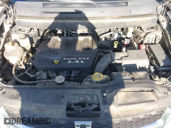 2013 Dodge Journey American Value z VIN 3C4PDCABXDT502219, wystawiony jako IAAI lot #43144633 z przebiegiem 166 589 mil mil oraz . Historia ofert i sprzedaży dostępna na DreamBid. Obrazek 10.