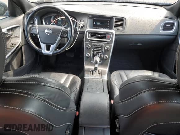 2015 Volvo S60 T5 Premier с VIN YV1612TB6F1299877, выставлен на аукционе Copart как лот 62590695 с пробегом 91 096 миль миль и Списание • Salvage title. История ставок и продаж доступна на DreamBid. Изображение 8.
