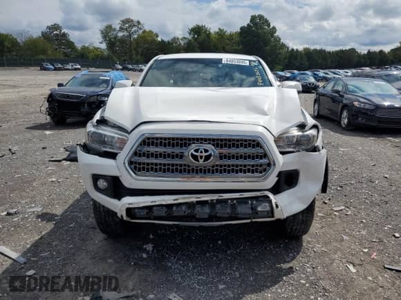 2017 Toyota Tacoma TRD Off Road with VIN 3TMDZ5BNXHM027454, listed as a Copart auction lot 84053695 with 131,703 mi miles and Salvage title. Bid and sale history available at DreamBid. Image 5.