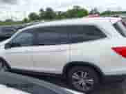 2017 Honda Pilot EX-L with VIN 5FNYF5H50HB002326, listed as a IAAI auction lot 42356845 with 101,098 mi miles and . Bid and sale history available at DreamBid. Image 14.